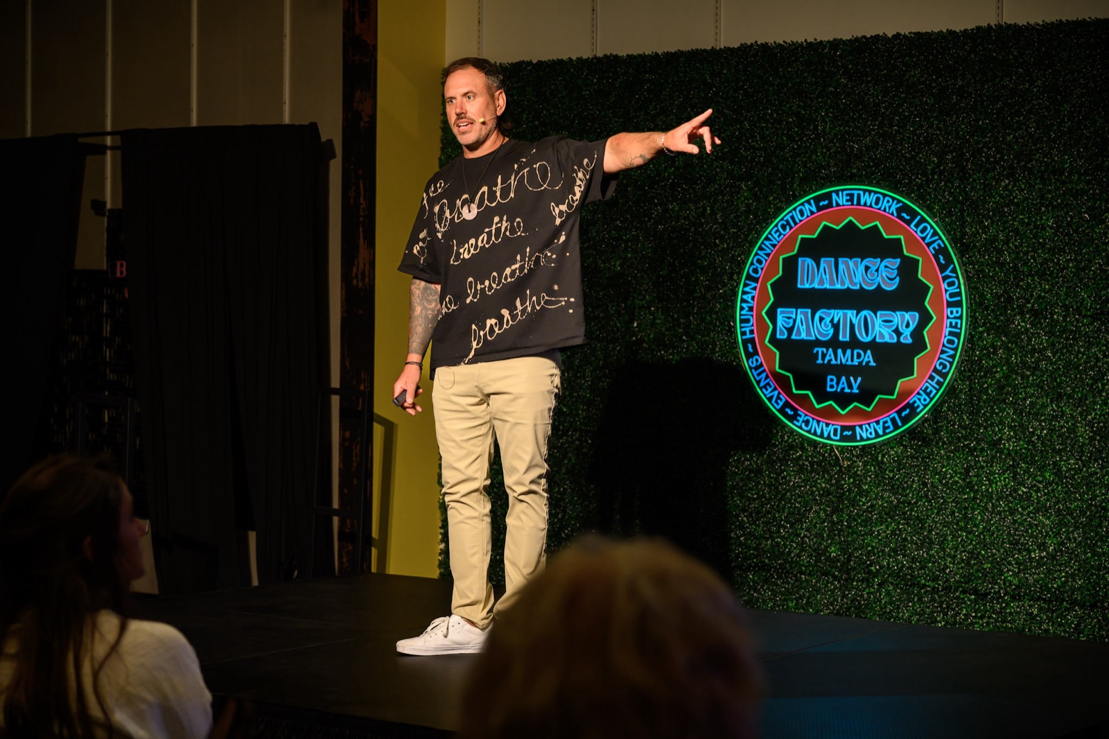 Michael Thomas leading a Vagal Method breathwork session on stage